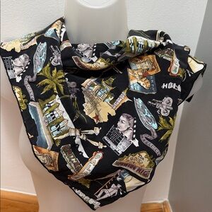 A vintage-style novelty print bandana, scarf featuring iconic Hollywood motifs